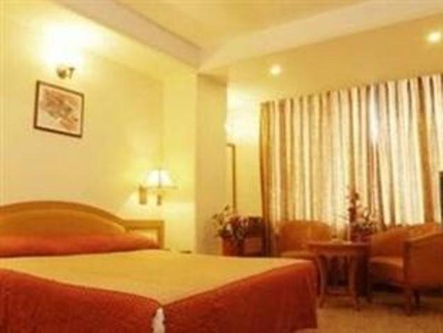 The Ambience Hotel Пюн Стая снимка